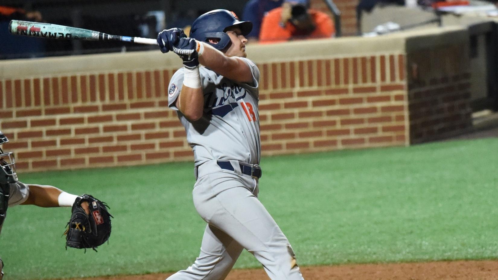 Auburn Tigers' Ike Irish hits a solo home run against the Stetson Hatters during the NCAA Regional Baseball Tournament