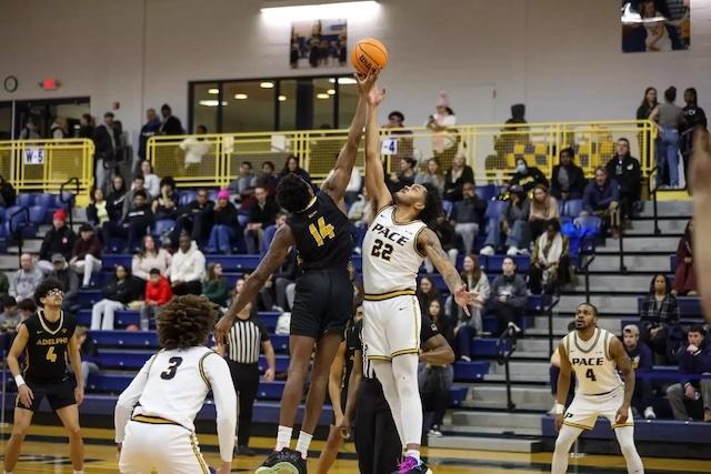 Jarnel Rancy goes for the block in DII men's basketball. 