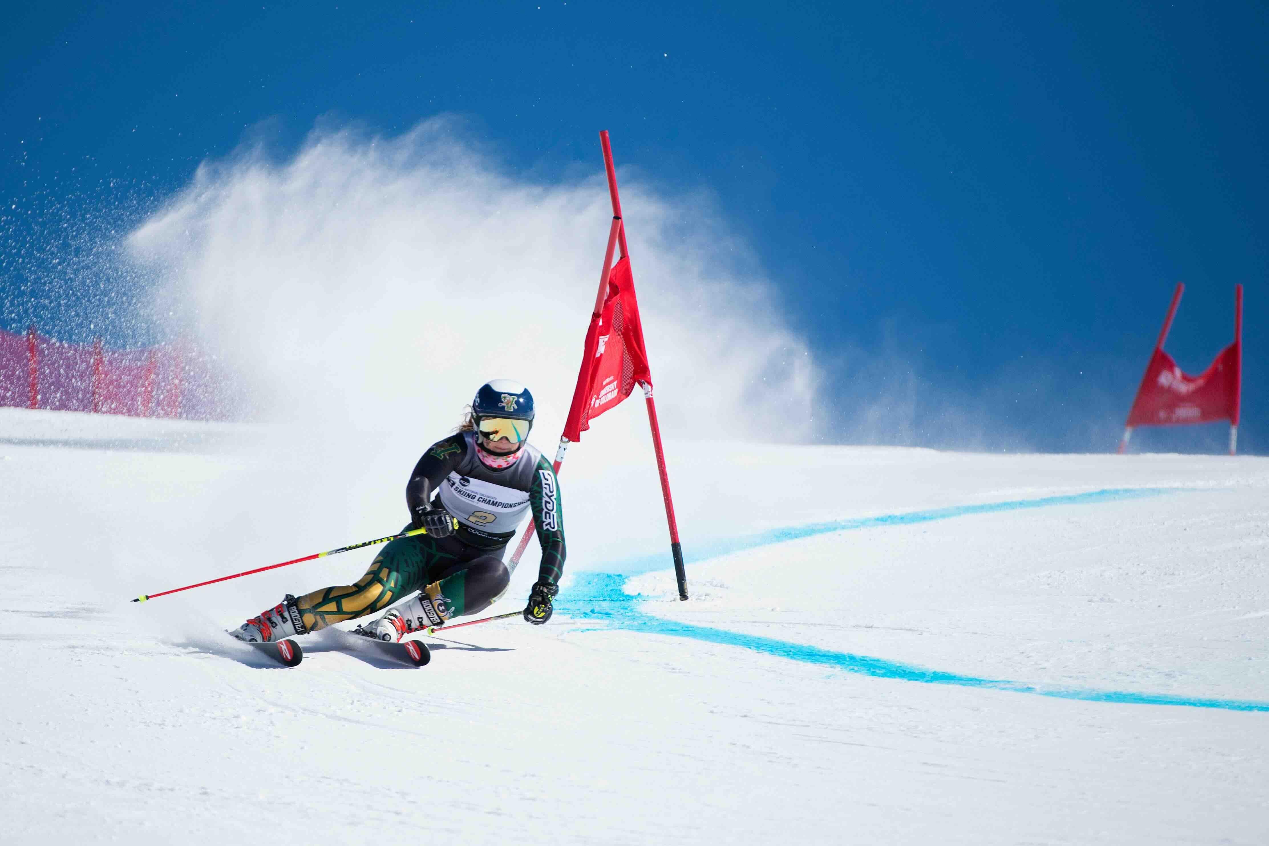 Moltzan competes in the women's slalom at the national championships, where she beat second-place Andrea Komsic of the University of Denver by four-tenths of a second. 